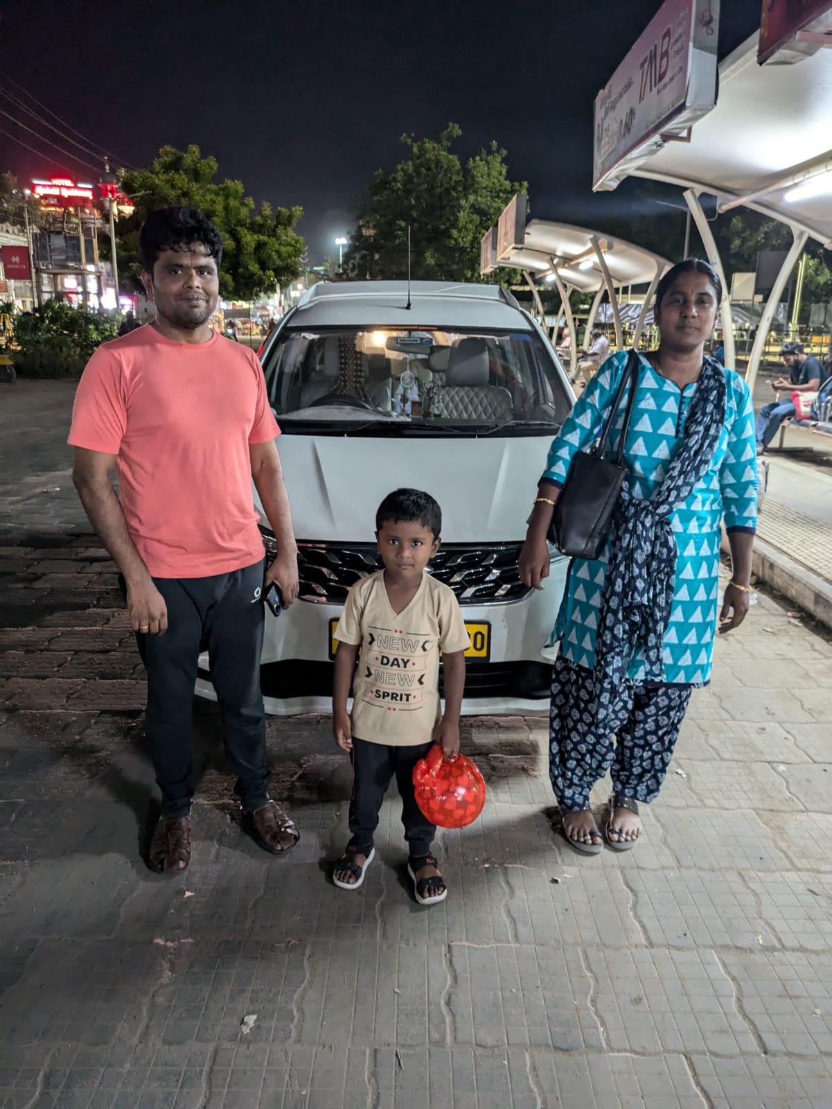 Family ready for tour at Trichy bus stand